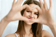 © puhhha - Beautiful Girl Showing Heart With Hands