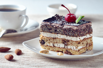 Delicious dessert cake with chocolate cream