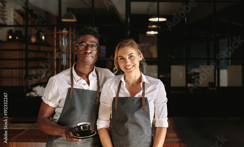 Cuadros en Lienzo Business owner couple at their coffee shop