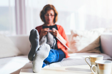 Canvas Print - Senior woman relaxing at home.