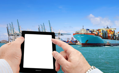 Poster - Close up of businessman using smart phone for logistic business on cargo ship background