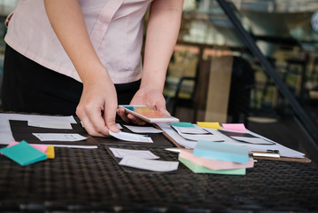 user experience, ux designer designing web on smartphone layout. ui planning mobile application. dev
