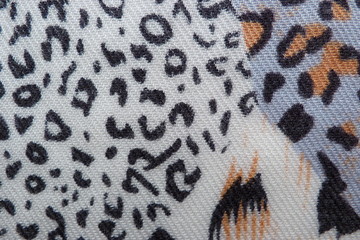 motley colored fabric scarf dress close-up background for design background textile cloth clothes vintage natural fabric flax cotton wool abstract illustration white-black leopard print drawing