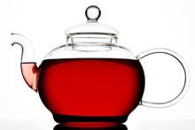 Close Up Of Glass Teapot With Tea