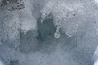 Snow Winter background, close-up of frosted ice lump on a snowing day with copy space