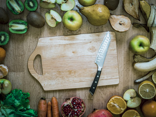 Wall Mural - cut fruits on the wooden table top view