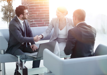 business handshake women with the client