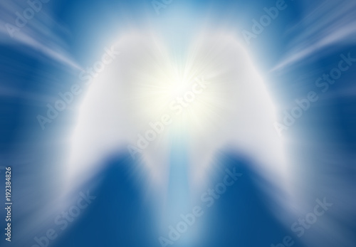 Beautiful abstract shape of an angel drawing with clouds on blue sky
