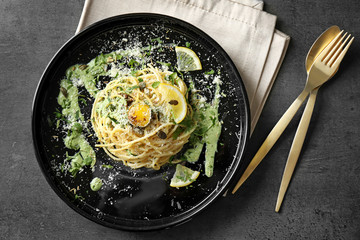 Sticker - Delicious pasta with egg yolk and sauce on plate