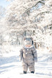 © Yura - child in the forest in the snow