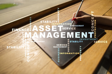 Asset management on the virtual screen. Business concept. Words cloud.