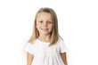 © Wordley Calvo Stock - head shot portrait of sweet and beautiful 7 years old young girl with blond hair  smiling happy posing isolated on white background