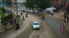 People, Cars, Motorbikes And Rickshaws On The Street. The Traffic On On The Streets In Kathmandu, Nepal. Time-lapse. Titl-shift