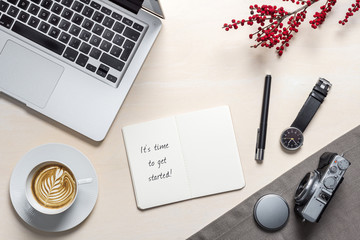 Wall Mural - It's time to get started written on notepad in office as flat lay
