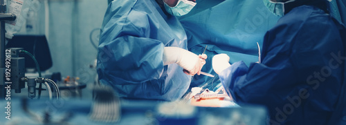 Cuadros en Lienzo Medical team of surgeons in hospital doing minimal invasive surgical interventions