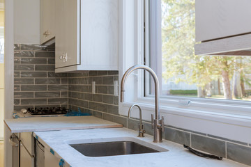 Wall Mural - Installing new induction hob in modern kitchen