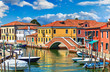 Island Murano in Venice Italy. View on canal with boat