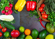 © timolina - Composition with assorted raw organic vegetables and fruits. Detox diet. Top view
