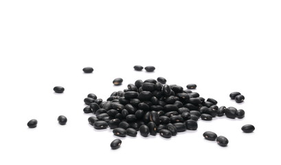 Pile organic black beans, isolated on white background