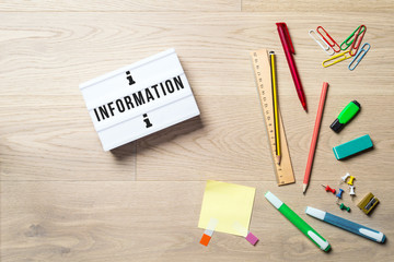 Wall Mural - information written on lightbox in office as flatlay
