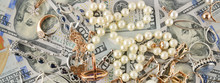 Background Of American Dollars And Jewelry. Flat Lay, Top View.
