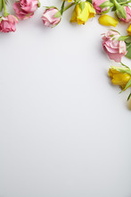 Elegant Feminine Mockup With Small Spring Roses On White Background With Text Space