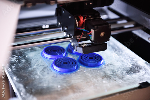 The 3d Printer Prints The Details Of The Blue Plastic 3d Printing Of Abs Or Pla Plastic On A Transparent Glass Platform Buy This Stock Photo And Explore Similar Images At