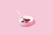 © Tegan Isha  - Healthy Morning Breakfast against Pink Background, Studio Shot