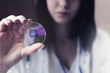 © focusandblur - Doctor or scientist holds chip technology
