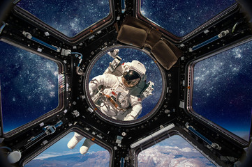 Wall Mural - astronaut in outer space