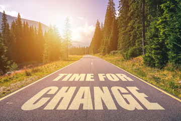 Wall Mural - Road concept - time for change, image of a road to the horizon with text time for change