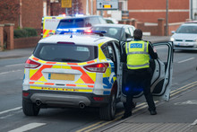 Policeman Entering Vehicle