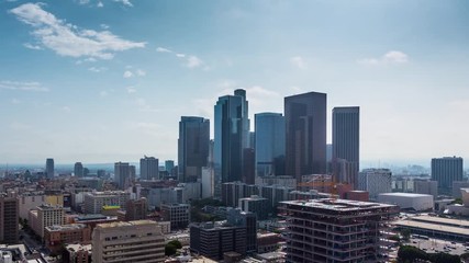Fototapete - Zoom in on downtown Los Angeles. Aerial view of day city. 4K UHD timalapse