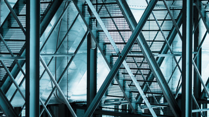 Abstract metal staircase with blue shade.