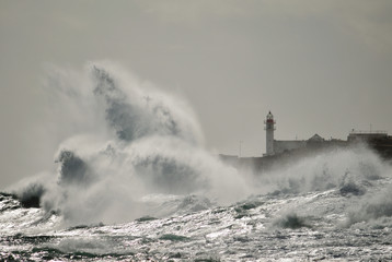  Strong waves and lighthouse in background, Taliarte, coast of Telde, Canary islands