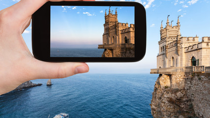 Wall Mural - tourist photographs Swallow Nest castle in Crimea