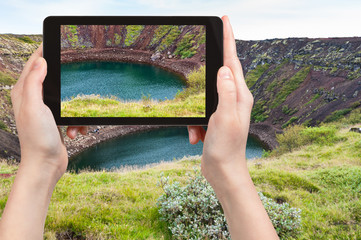 Poster - tourist photographs old volcanic crater with lake