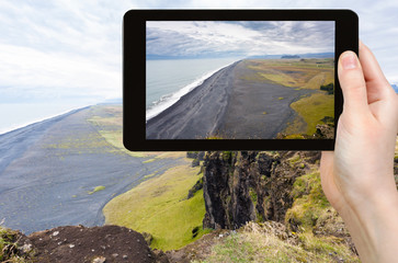 Canvas Print - tourist photographs Solheimafjara coastline