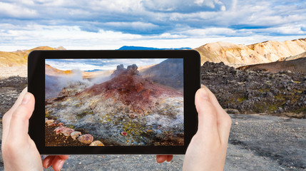 Poster - tourist photographs acid geyser at Laugahraun