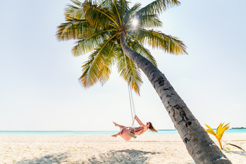 Poster - Young woman relaxing at beach