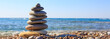 Leinwandbild Motiv Spa stones balance on beach.