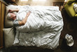 © Rawpixel.com - Elderly Caucasian man sleeping on the bed