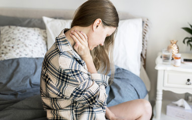 Wall Mural - Caucasian girl wake up with neck pain