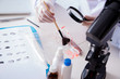 © Elnur - Criminologist police chemist looking at crime evidence