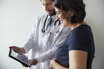 Poster - Pregnant woman having fetal monitoring by doctor