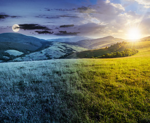 Wall Mural - time change concept over the grassy meadow in mountains. beautiful summer countryside under the gorg