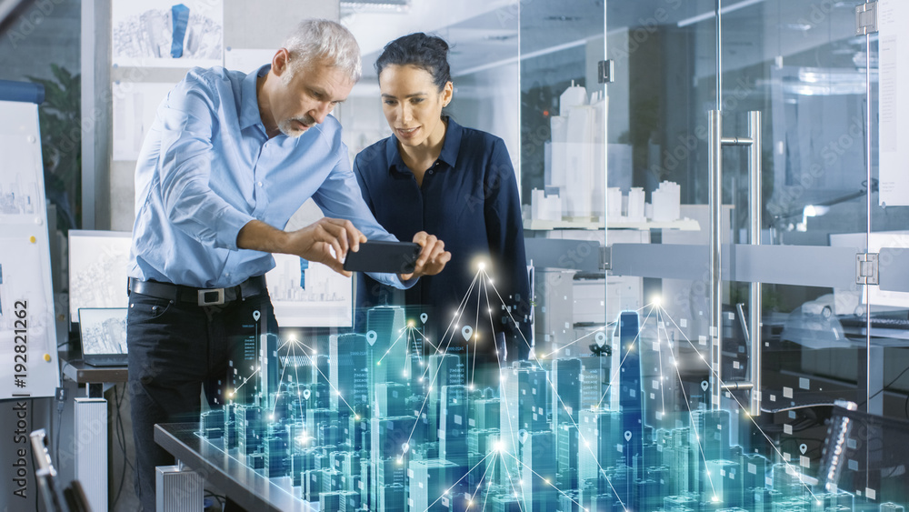 Male and Female Architects Work with Holographic Augmented Reality 3D ...