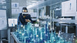 © Gorodenkoff - Professional Female Architect Wearing  Augmented Reality Headset Work with 3D City Model. High Tech Office Use Virtual Reality Modeling Software Application.