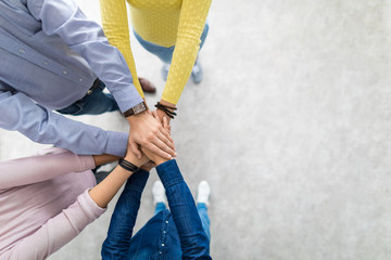 Fototapete - Stack of hands. Unity and teamwork concept.