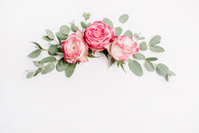 Floral Composition With Pink Rose Flower Buds And Eucalyptus On White Background. Flat Lay, Top View. Blog Hero Header.